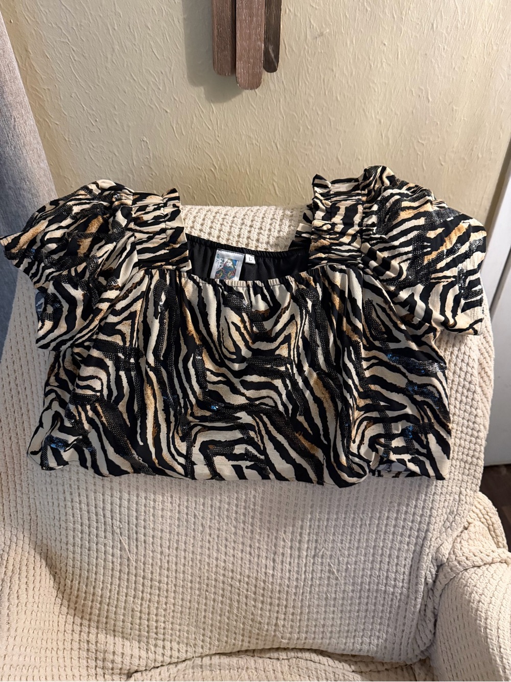 QUEEN OF SPARKLES Zebra-Print Puff Sleeve Crop Top in Black, Cream & Tan